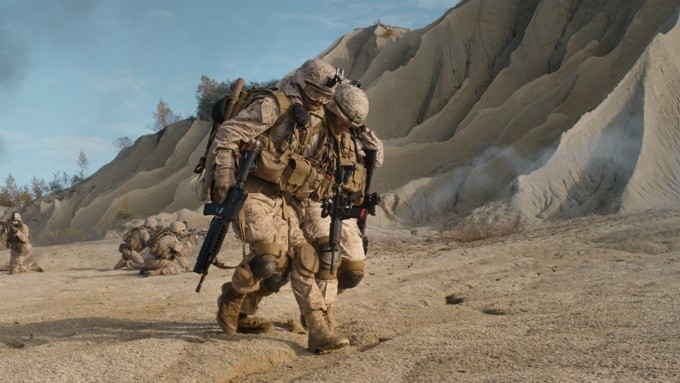 soldiers helping each other in Iraq