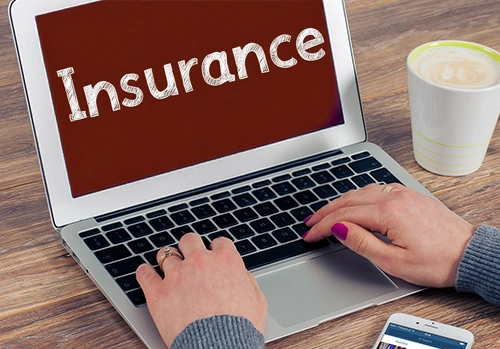 photo of a woman taking a course for a life insurane license